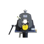 Orbitalum pipe cutting and beveling machine with front view showing circular cutting head and handle.